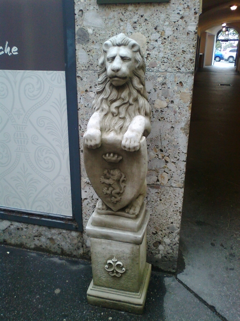 Stone lion with shield, near the main street of Salzburg