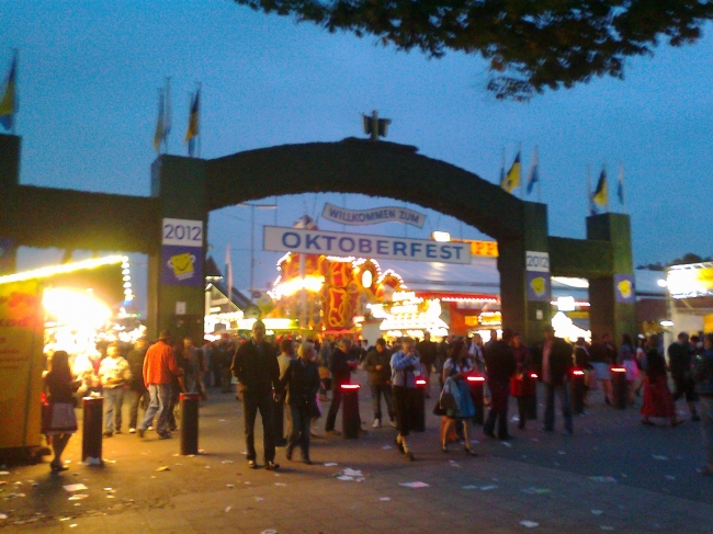 Main entry of the Oktoberfest 2012, as seen from Bavariaring, near the main crossing North of the Festwiesn