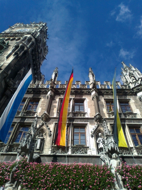 Facade detail of the Neues Rathaus in Munich, with flags, 