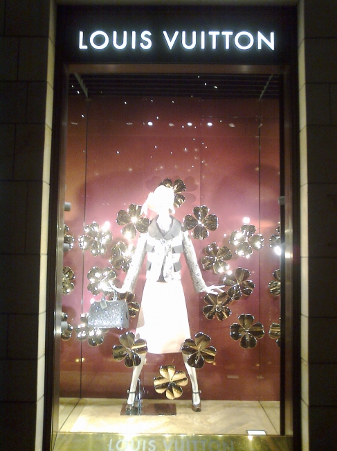 Louis Vuitton December window, golden flowers