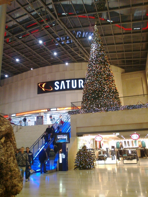 Giant christmas tree, at Forum Duisburg, now home to a giant golden ladder and a giant fake christmas tree, don't miss it!