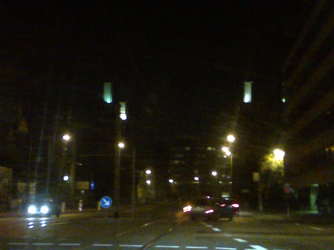 Schwanentor at night, seen from the nearby intersection