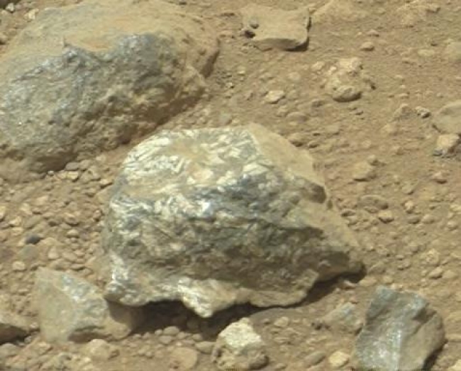 Bluish-Black Rock with White 'Crystals' on Mars, The Mast Camera (Mastcam) on NASA's Mars rover Curiosity showed researchers interesting color and patterns in this unnamed rock imaged during the 27th Martia...