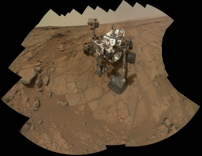Curiosity Rover's Self Portrait at 'John Klein' Drilling Site, Figure 1 Click on the image for larger version This self-portrait of NASA's Mars rover Curiosity combines 66 exposures taken by the rover's Mars Hand Lens Im...