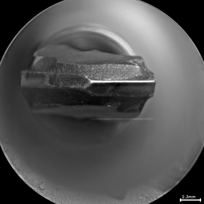 Drill Bit Tip on Mars Rover Curiosity, Head-on View, This head-on view shows the tip of the drill bit on NASA's Mars rover Curiosity. The view merges two exposures taken by the remote micro-imager in the rover'...