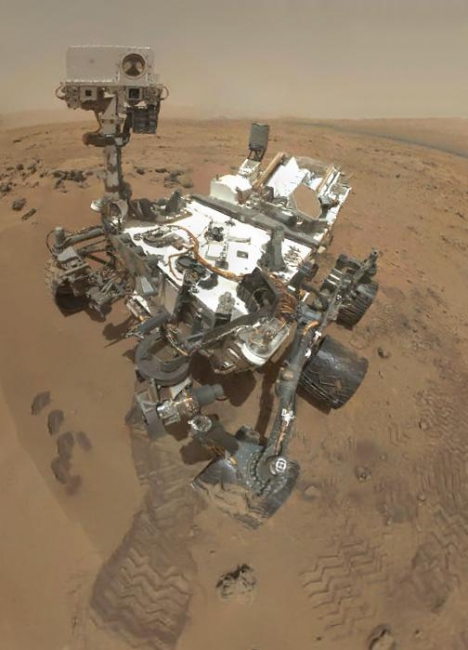 Preliminary Self-Portrait of Curiosity by Rover's Arm Camera, On Sol 84 (Oct. 31, 2012), the Curiosity rover used the Mars Hand Lens Imager (MAHLI) to capture the set of thumbnail images stitched together to create this...
