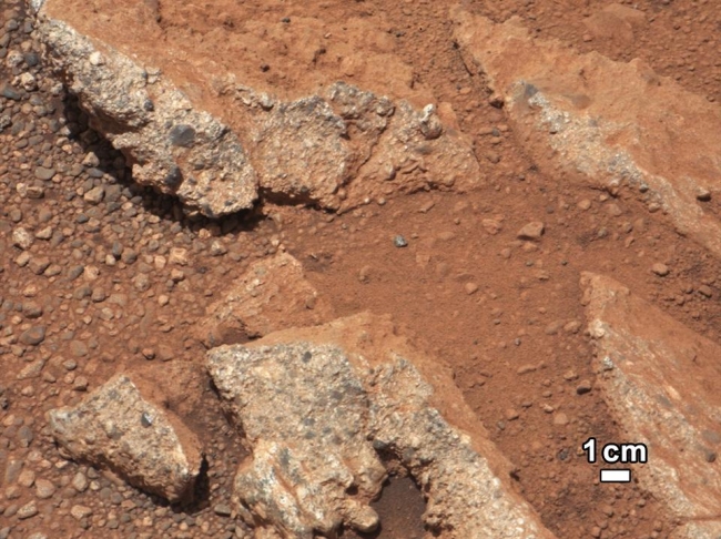 Link to a Watery Past, In this image from NASA's Curiosity rover, a rock outcrop called Link pops out from a Martian surface that is elsewhere blanketed by reddish-brown dust. The ...