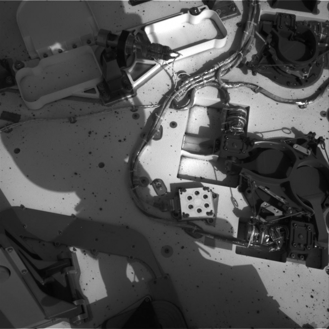 Opening and Closing SAM,  This set of images from NASA's Curiosity rover shows the inlet covers for the Sample Analysis at Mars instrument opening and closing, as the rover continues...