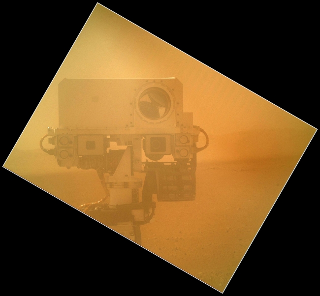 Rover Takes Self Portrait,  On Sol 32 (Sept. 7, 2012) the Curiosity rover used the Mars Hand Lens Imager (MAHLI) located on its arm to obtain this self-portrait. The image shows the to...