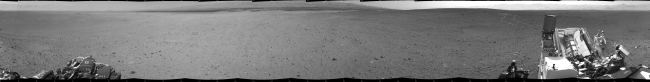 Looking Back at Tracks from Sol 24 Drive, NASA's Mars rover Curiosity drove about 70 feet (about 21 meters) on the mission's 21st Martian day, or sol (Aug. 30, 2012) and then took images with its Nav...