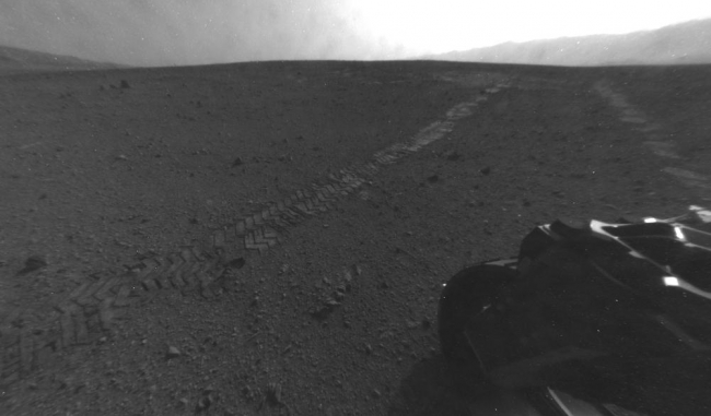 Tracks from Eastbound Drive on Curiosity's Sol 22,  On Aug. 28, 2012, during the 22nd Martian day, or sol, after landing on Mars, NASA's Curiosity rover drove about 52 feet (16 meters) eastward, the longest d...