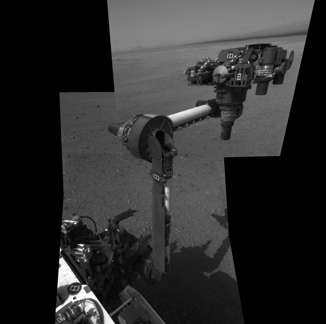Curiosity's First Arm Extension, Full Resolution, The extended robotic arm of NASA's Mars rover Curiosity can be seen in this mosaic of full-resolution images from Curiosity's Navigation camera (Navcam). Cur...