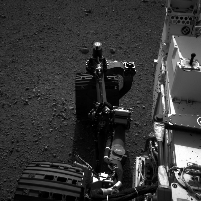 Wiggle in the Gravel, This set of images shows the movement of the rear right wheel of NASA's Curiosity as rover drivers turned the wheels in place at the landing site on Mars. En...