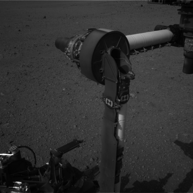 Part of Curiosity's Outstretched Arm, Full-Resolution, This full-resolution image from NASA's Curiosity shows the elbow joint of the rover's extended robotic arm on Aug. 20, 2012. The Navigation Camera captured t...