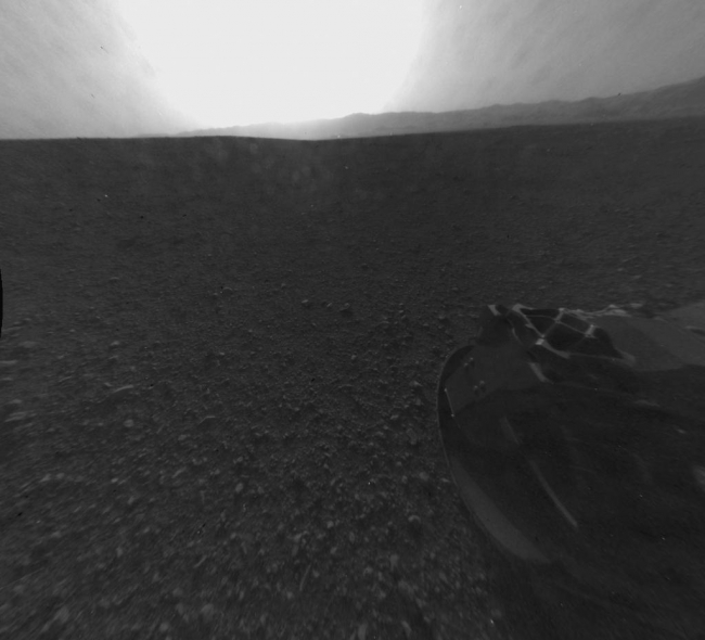 Looking Back at the Crater Rim,  This is the full-resolution version of one of the first images taken by a rear Hazard-Avoidance camera on NASA's Curiosity rover, which landed on Mars the e...