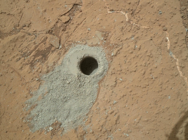 'Cumberland' Target Drilled by Curiosity, NASA's Mars rover Curiosity drilled into this rock target, "Cumberland," during the 279th Martian day, or sol, of the rover's work on Mars (May 19, 2013) and...