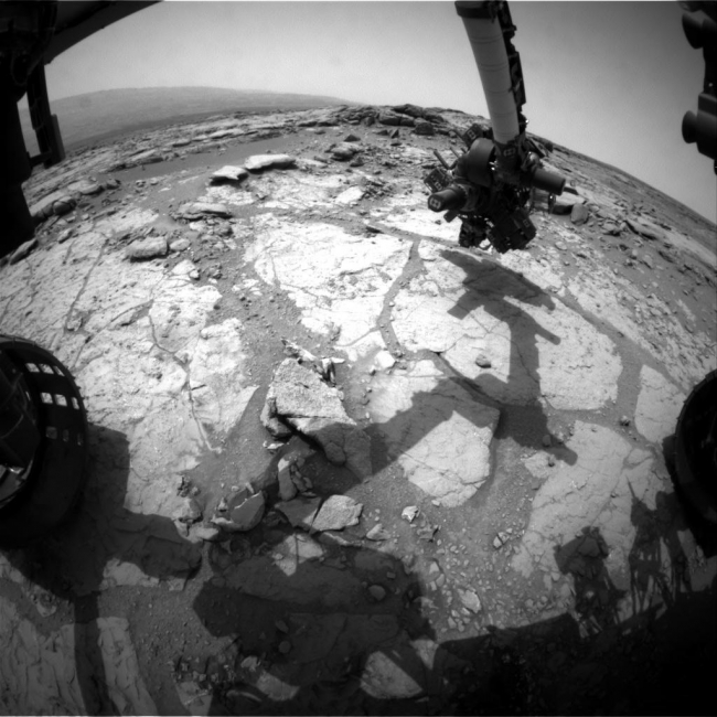 Curiosity at 'Cumberland', NASA's Mars rover Curiosity used its front left Hazard-Avoidance Camera for this image of the rover's arm over the drilling target "Cumberland" during the 27...