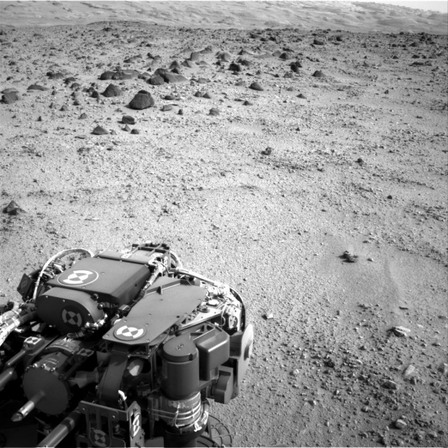 Heading for Mount Sharp, Sol 329, Lower slopes of Mount Sharp appear at the top of this image taken by the right Navigation Camera (Navcam) of NASA's Mars rover Curiosity at the end of a driv...