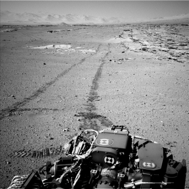 Curiosity's View Back After Passing 'Junda' Striations, NASA's Curiosity Mars rover used the Navigation Camera (Navcam) on its mast for this look back after finishing a drive of 328 feet (100 meters) on the 548th ...
