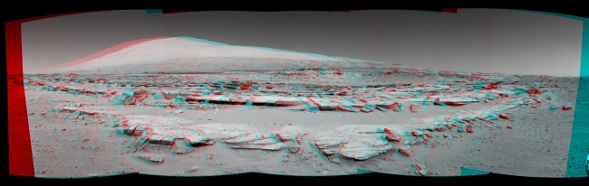 Martian Landscape With Rock Rows and Mount Sharp (Stereo), This stereo landscape scene from NASA's Curiosity Mars rover shows rows of rocks in the foreground and Mount Sharp on the horizon. It appears three dimension...