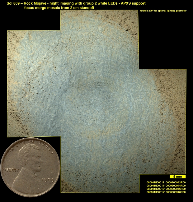 Crystals May Have Formed in Drying Martian Lake, Lozenge-shaped crystals are evident in this magnified view of a Martian rock target called "Mojave," taken by the Mars Hand Lens Imager (MAHLI) instrument on...