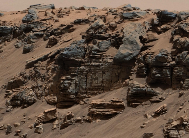 Sedimentary Signs of a Martian Lakebed, Figure 1 Click on the image for larger version This evenly layered rock photographed by the Mast Camera (Mastcam) on NASA's Curiosity Mars Rover shows a patt...