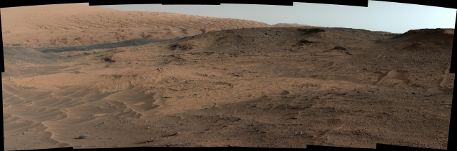 Curiosity Mars Rover's Approach to 'Pahrump Hills', This southeastward-looking vista from the Mast Camera (Mastcam) on NASA's Curiosity Mars rover shows the "Pahrump Hills" outcrop and surrounding terrain seen...