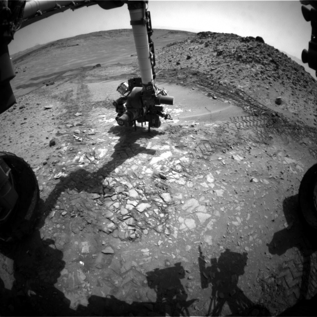 Candidate Drilling Target on Mars Doesn't Pass Exam, This image from the front Hazard Avoidance Camera (Hazcam) on NASA's Curiosity Mars rover shows the rover's drill in place during a test of whether the rock ...