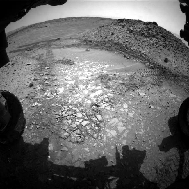 View Down 'Hidden Valley' Ramp at 'Bonanza King' on Mars, The pale rocks in the foreground of this fisheye image from NASA's Curiosity Mars rover include the "Bonanza King" target under consideration to become the f...