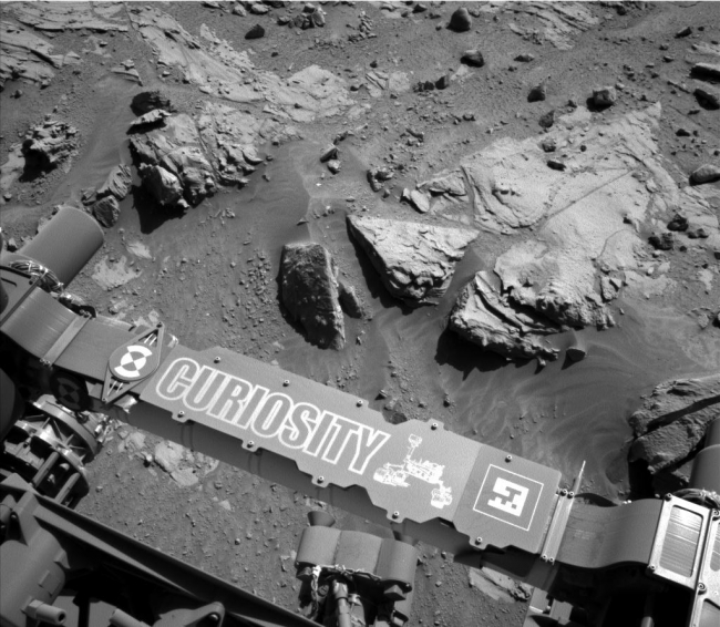 Curiosity Mars Rover Beside Sandstone Target 'Windjana', This image from the Navigation Camera (Navcam) on NASA's Curiosity Mars rover shows a sandstone slab on which the rover team has selected a target, "Windjana...