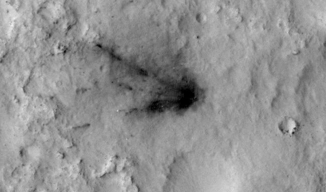 Changes in Scars From 2012 Mars Landing,  Main Animation  Figure 1  Figure 2  Figure 3  Spacecraft that land in dusty areas of Mars create dark blast zone patterns where bright dust is blown away by...