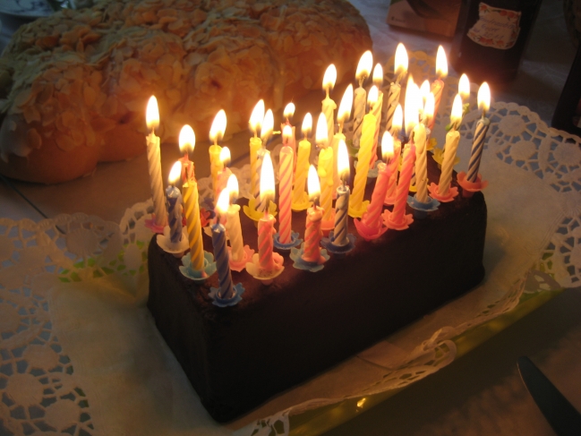 Birthday cake, lots of candles...