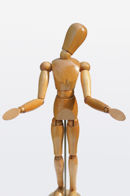 Mannequin feels pitty, Wooden painter's posing mannequin feels pitty, gesturing being-sorry or stumped with a tilted head and open arms, slight bukeh on the hands, light from upper...