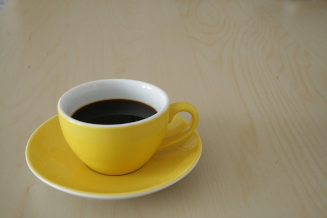 Cup of coffee on a conference table, 