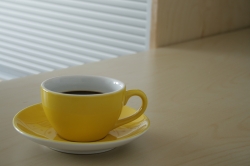 Yellow cup of coffee o...