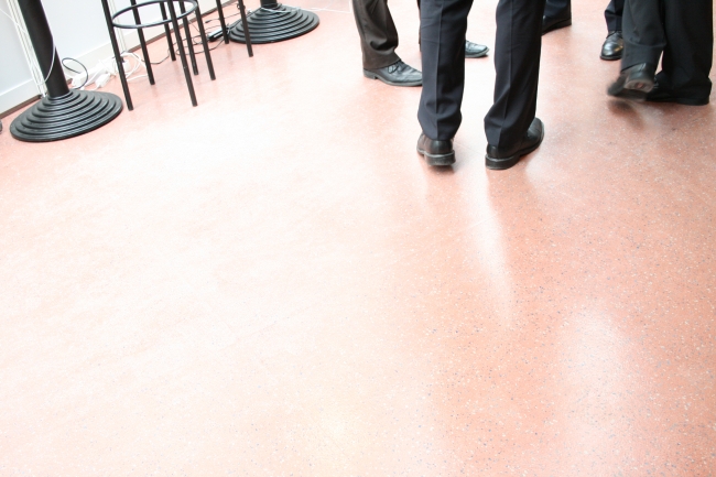 A business meeting, Men stading in conversation