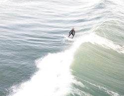 Surfer riding the wave