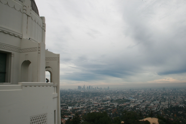 Looking over Los Angeles with Downtown in fog and a part of Griffith Park Obs. on the left, The Obs's commanding view of the Los Angeles Basin, including Downtown Los Angeles to the southeast, Hollywood to the south, and the Pacific Ocean to the sou...