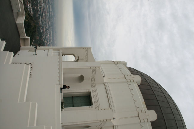 The Impressive facade of the east dome of the Griffith Park Observatory, L.A. behind