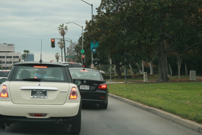 North Santa Monica Blvd, crossing N Rexford Dr, with Crescent Dr being next, heading West