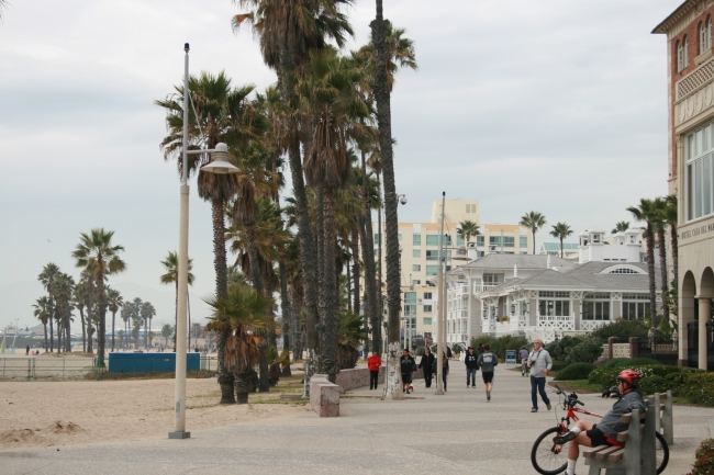 Late Afternoon on the beach of Santa Monica, seen from the dead end of Bay Street, with Shutters on the Beach in the distance and teh Ocean Front at Casa del Mar on the right