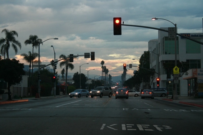 Looking up Santa Monica Boulevard with an evening sky above, 