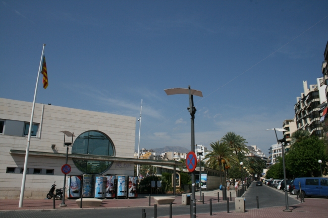 Boat house and yacht club at the port of Benidorm, looking down Paseo de Colón