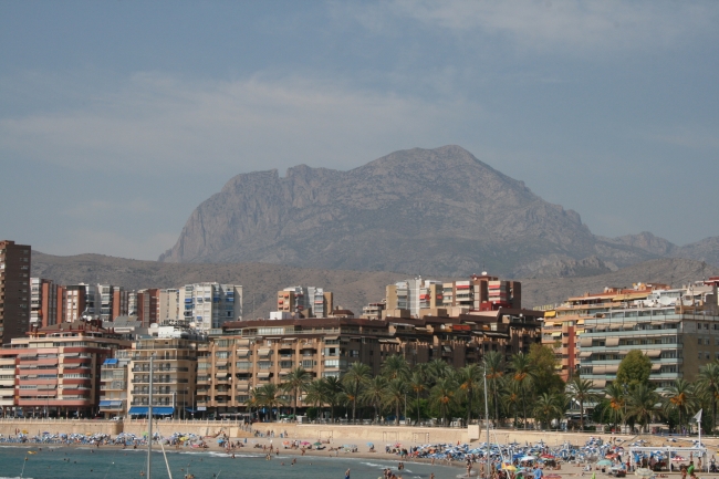 The mountain behind Poniente beach, Parc d'Elx and beach in foreground