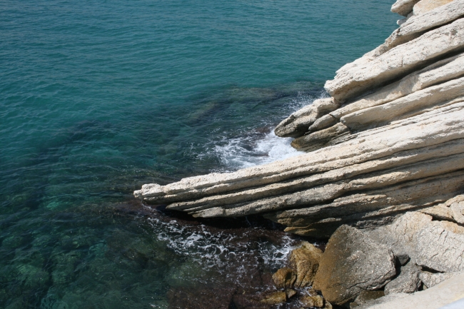 Rocks and spray at the base of the Castel, 