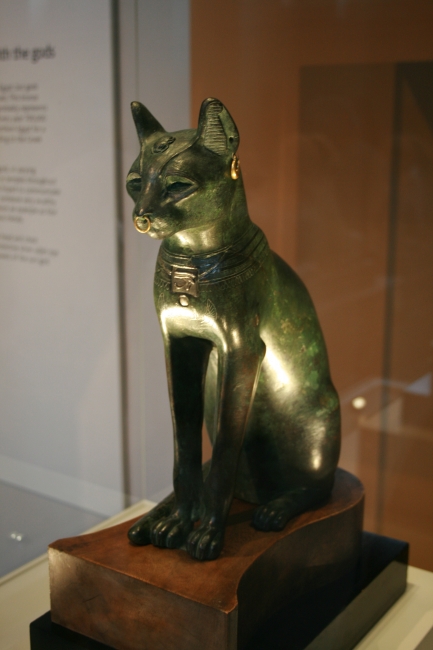 In Egypt, cats were holy, as this one, in green and gold