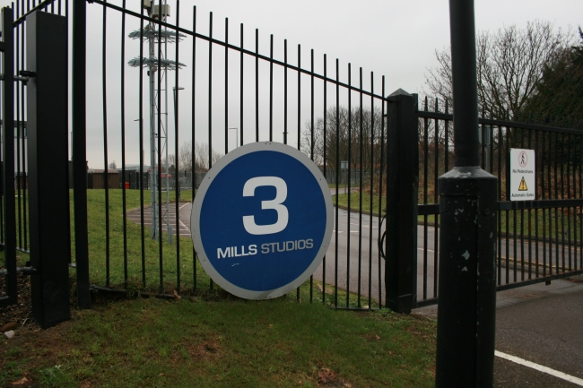 3 Mills Studio gate, and logo on the fence