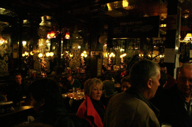 Inside "The Salisbury", stenciled mirrors and dark wood