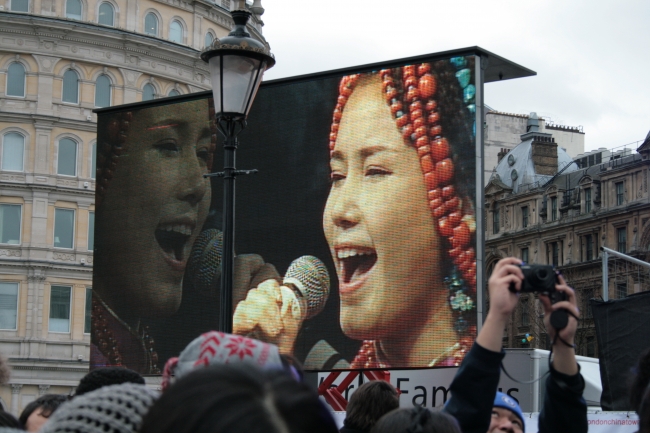 A Chinese singer, on the Jumbotron LED wall