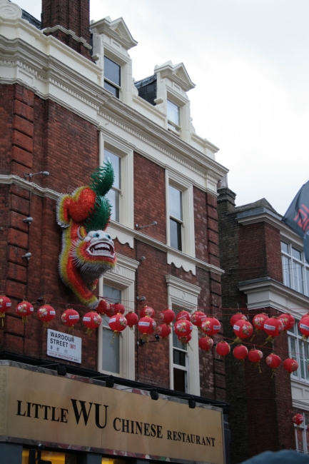 "Little Wu" Chinese Restaurant, and a lion-tiger-dragon